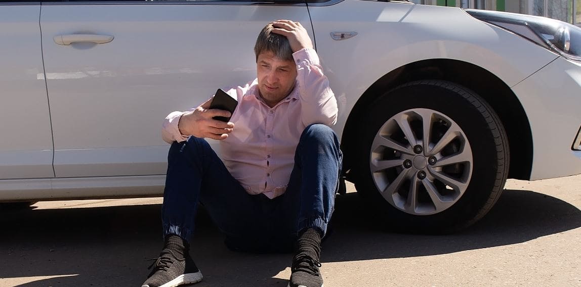 A car pulls his hair because of his car issue